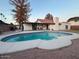 Inviting backyard oasis with a sparkling pool at 1745 E Glade Ave, Mesa, AZ 85204