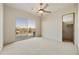 Bedroom with sliding door to patio and mountain views at 28819 N 151St St, Scottsdale, AZ 85262