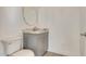 Small bathroom with gray vanity and granite countertop at 2917 N Katie Ln, Litchfield Park, AZ 85340