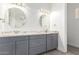 Bathroom with gray double vanity and granite countertop at 2917 N Katie Ln, Litchfield Park, AZ 85340
