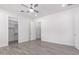Bedroom with large closet and wood-look flooring at 2917 N Katie Ln, Litchfield Park, AZ 85340