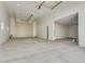 Large garage with high ceilings and extra storage space at 2917 N Katie Ln, Litchfield Park, AZ 85340
