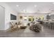 Virtually staged living room with open concept kitchen at 2917 N Katie Ln, Litchfield Park, AZ 85340