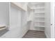 Bright walk-in closet featuring ample shelving and hanging space at 2917 N Katie Ln, Litchfield Park, AZ 85340