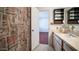 Bathroom includes a vanity sink, shower, and linen cabinet at 3433 W Mescal St, Phoenix, AZ 85029