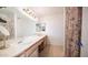 Double vanity bathroom with shower and ample counter space at 3433 W Mescal St, Phoenix, AZ 85029