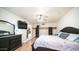 Main bedroom with a king-size bed and wood floors at 3433 W Mescal St, Phoenix, AZ 85029