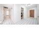Bright and airy entryway with tile flooring and access to other rooms at 3433 W Mescal St, Phoenix, AZ 85029