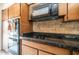 Kitchen features built-in microwave, electric cooktop and double oven at 3433 W Mescal St, Phoenix, AZ 85029