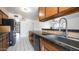 Kitchen with granite countertops and stainless steel appliances at 3433 W Mescal St, Phoenix, AZ 85029