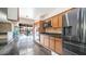 Kitchen features granite countertops, stainless steel appliances, and backyard views at 3433 W Mescal St, Phoenix, AZ 85029