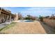 Spacious backyard with pool, lounge chairs, and covered patio at 3433 W Mescal St, Phoenix, AZ 85029