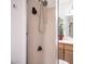Clean and functional shower stall with a standard shower head at 3433 W Mescal St, Phoenix, AZ 85029