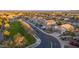 Aerial view showing the house's location on a quiet street in a residential neighborhood at 3531 E Peartree Ln, Gilbert, AZ 85298