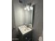 Bathroom with gray vanity, updated sink, and mirror at 451 N 110Th St, Mesa, AZ 85207