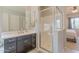 Bathroom with vanity, shower, and neutral color palette at 4866 N 185Th Dr, Goodyear, AZ 85395