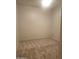Well-lit bedroom with neutral carpet, ceiling fan, and electrical outlets at 4866 N 185Th Dr, Goodyear, AZ 85395