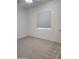 The bedroom features neutral walls and a window at 4866 N 185Th Dr, Goodyear, AZ 85395
