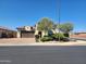 Charming single-story home features a two-car garage, landscaped yard, and lovely curb appeal at 4866 N 185Th Dr, Goodyear, AZ 85395