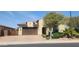 Charming single-story home features a well-maintained yard, tiled roof, and welcoming two-car garage at 4866 N 185Th Dr, Goodyear, AZ 85395