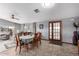 Bright dining area with table and chairs, near the living room at 5221 E Hermosa Vista Dr, Mesa, AZ 85215