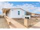 Front view of a charming white single story home at 5221 E Hermosa Vista Dr, Mesa, AZ 85215