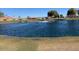 Serene pond with water fountain and homes at 7950 E Keats Ave # 194, Mesa, AZ 85209