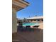 Community pool with lounge chairs and patio at 7950 E Keats Ave # 194, Mesa, AZ 85209