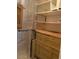Custom storage with shelving and dresser in utility area at 7950 E Keats Ave # 194, Mesa, AZ 85209