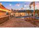 Beautiful outdoor pool area with brick patio, bar, and lush landscaping, perfect for entertaining guests at 9623 W Tierra Grande --, Peoria, AZ 85383