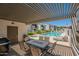 Relaxing patio area with table, chairs, and BBQ grill at 6480 N 82Nd St # 2203, Scottsdale, AZ 85250