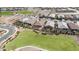Aerial view of neighborhood with pool and park at 21576 E Pecan Ct, Queen Creek, AZ 85142
