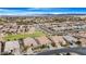Aerial view of neighborhood with community park and mountain views at 21576 E Pecan Ct, Queen Creek, AZ 85142