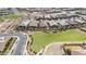 Aerial view of community with park and various homes at 21576 E Pecan Ct, Queen Creek, AZ 85142
