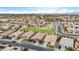 Aerial view of neighborhood with community park and mountain views at 21576 E Pecan Ct, Queen Creek, AZ 85142
