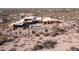 Aerial view of a modern house under construction with a pool and desert landscaping at 22805 N Church Rd, Scottsdale, AZ 85255