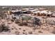 Aerial view of a new modern home under construction in the desert at 22805 N Church Rd, Scottsdale, AZ 85255