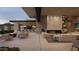 Spacious outdoor living area with fireplace and bar at 22805 N Church Rd, Scottsdale, AZ 85255