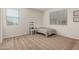 Inviting bedroom with cozy carpet and lots of natural light from the windows at 2578 N Acacia Way, Buckeye, AZ 85396