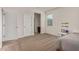 Neutral bedroom with carpet and a large closet, providing ample storage space at 2578 N Acacia Way, Buckeye, AZ 85396