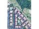 Aerial view of condo community near golf course with pool at 5122 E Shea Blvd # 1117, Scottsdale, AZ 85254
