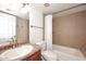 Bathroom featuring a vanity, tile shower with bathtub, and toilet at 5122 E Shea Blvd # 1117, Scottsdale, AZ 85254