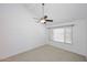 Bedroom featuring a large window and ceiling fan at 5122 E Shea Blvd # 1117, Scottsdale, AZ 85254