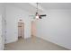 Spacious bedroom with a walk-in closet and ceiling fan at 5122 E Shea Blvd # 1117, Scottsdale, AZ 85254