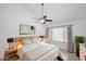 Serene bedroom with vaulted ceilings, a ceiling fan, and natural light creating a relaxing space at 5122 E Shea Blvd # 1117, Scottsdale, AZ 85254