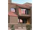 Exterior view of a two-story home showcasing the architecture and desert landscaping at 5122 E Shea Blvd # 1117, Scottsdale, AZ 85254