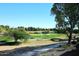 Peaceful view of a lush golf course and pond at 5122 E Shea Blvd # 1117, Scottsdale, AZ 85254