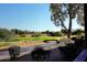 Scenic golf course view with lush green fairway and a bridge over a small stream at 5122 E Shea Blvd # 1117, Scottsdale, AZ 85254