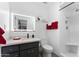 Clean bathroom with a modern vanity, updated shower, and illuminated mirror at 5835 E Dodge St, Mesa, AZ 85205