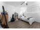 Cozy bedroom with a twin-sized bed, ample closet space and built-in shelving at 5835 E Dodge St, Mesa, AZ 85205